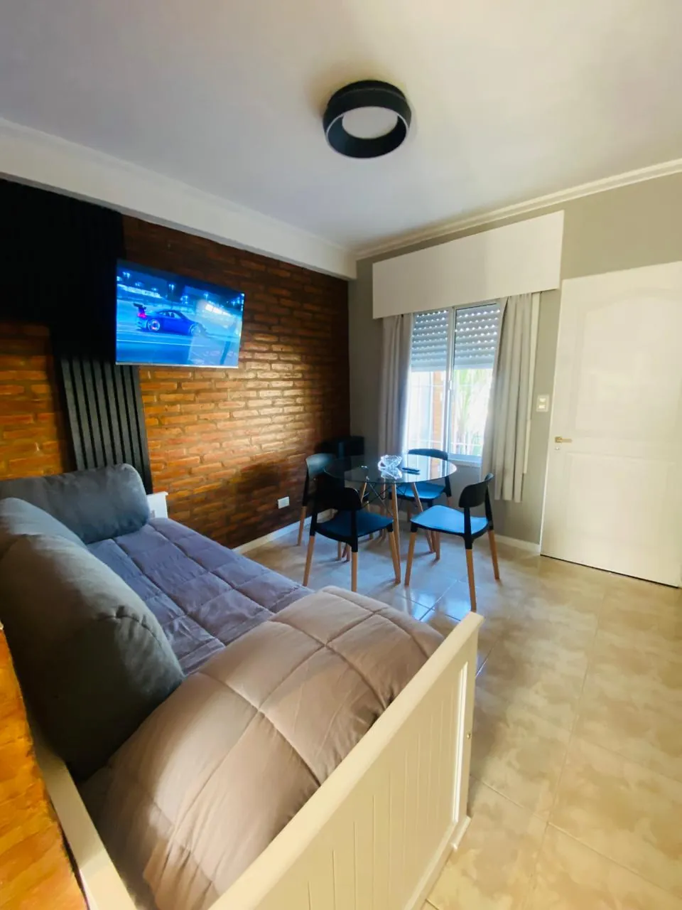 Living y comedor del Departamento Pioneros